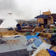 Refuse remains in the Dakota Access pipeline opponents’ main protest camp, as a fire burns in the background, on Wednesday, Feb. 22. (AP Photo/Blake Nicholson)